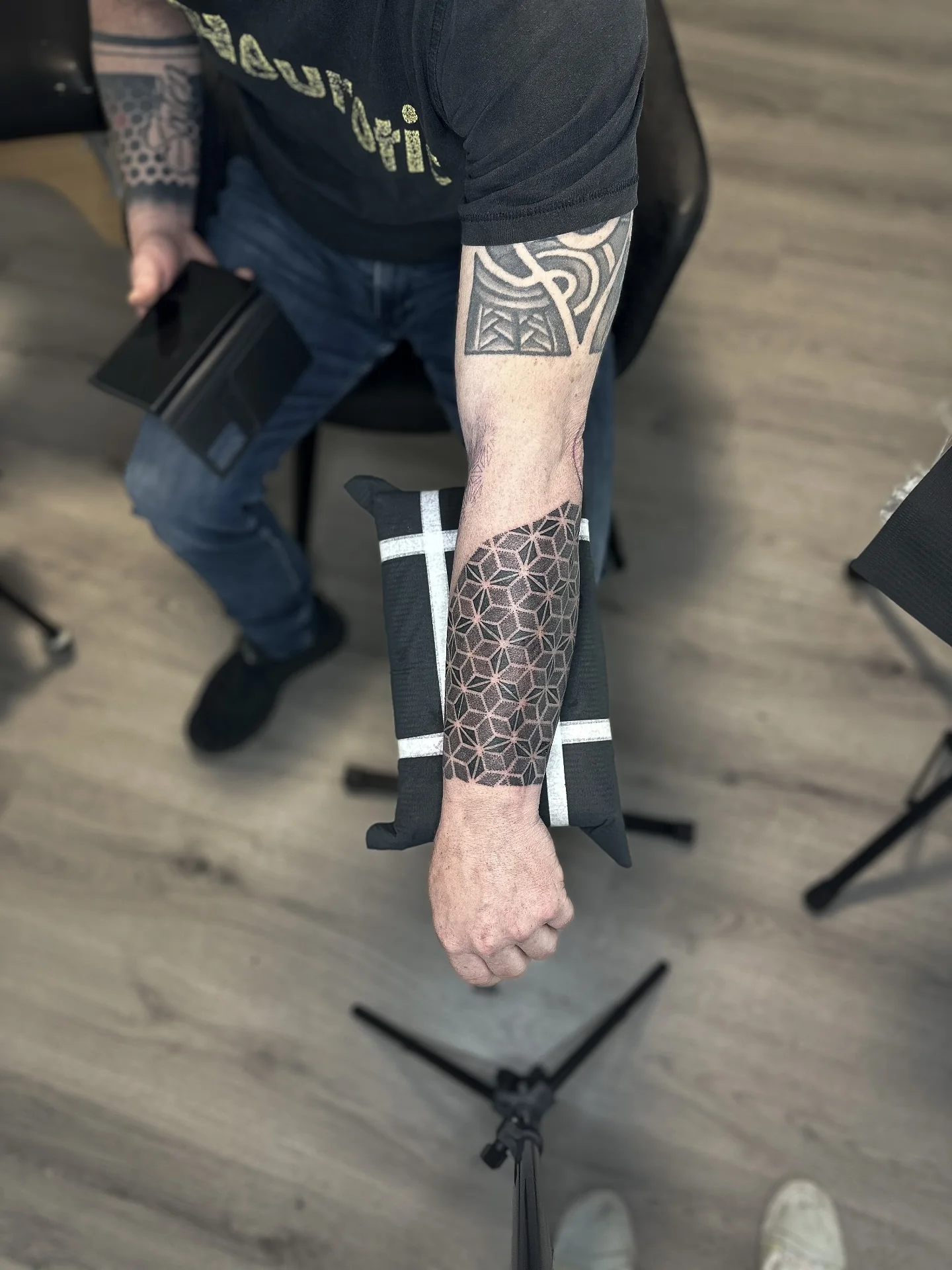 Geometriskt mönster på underarm